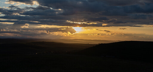 colorful dramatic sky with cloud at sunset.