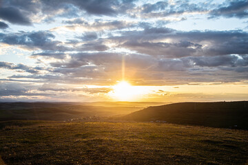colorful dramatic sky with cloud at sunset.