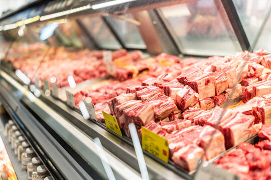 Fresh red meat cuts displayed in refrigerated case