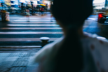 Pedestrians at busy city zebra crossing