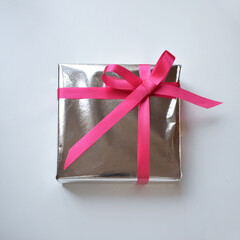 silver gift box with ribbon