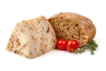 Seasoned cheese wedge with herbs and spices, isolated on white background.