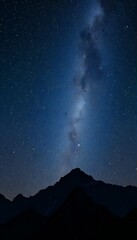 Obraz premium Night Sky Filled with Stars and Mountain Silhouettes 