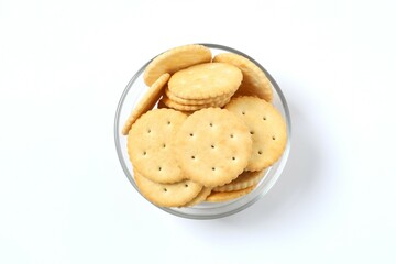 Delicious crispy crackers cookies in a plate on white background 