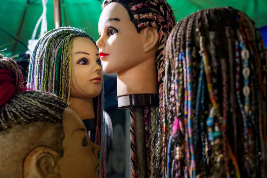 Mannequin heads with cornrow braids