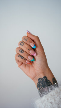Hand with rings and with a manicure done