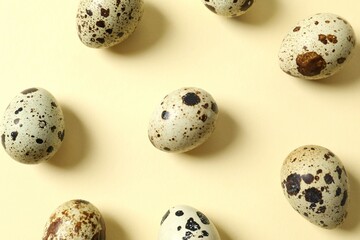 Quail eggs on color background
