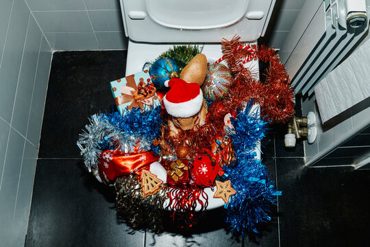 toilet full of christmas ornaments