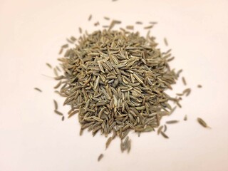 Little portion of dried rosemary, on a bright background.