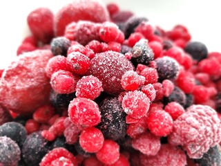 Frozen portion of delicious fruits, on a bright background.