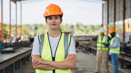A woman wearing a yellow vest