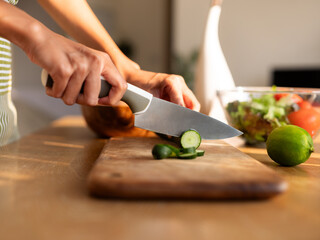 Preparing Fresh Vegetables on a Kitchen Cutting Board