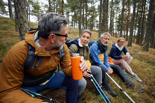 Friends take time to relax in the forest