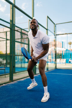 Paddle tennis player in a game
