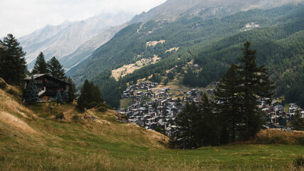 Overlooking Zermatt village, nestled among the Swiss Alps with stunning mountain backdrops.