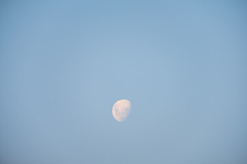 Moon on a blue sky background