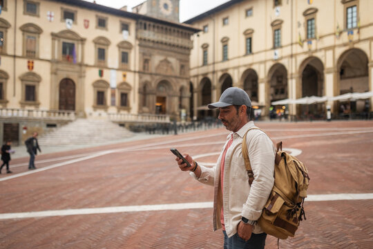 tourist visiting arezzo in tuscany, italy