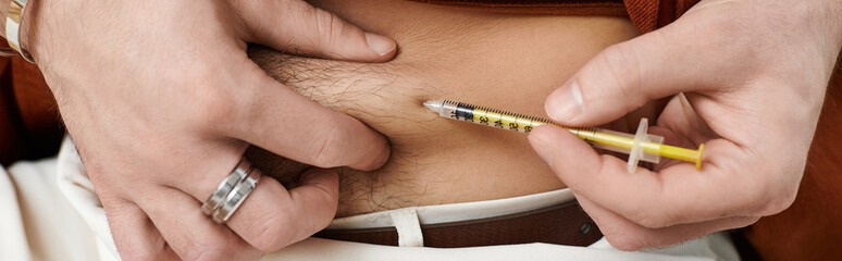 Young man with diabetes demonstrating daily insulin routine in modern apartment