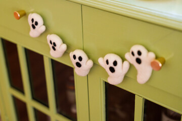 Ghost garland hangs on knobs