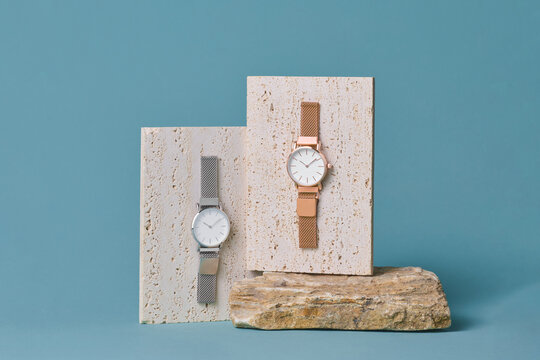 Elegant Modern Watches Displayed on Natural Stone Background