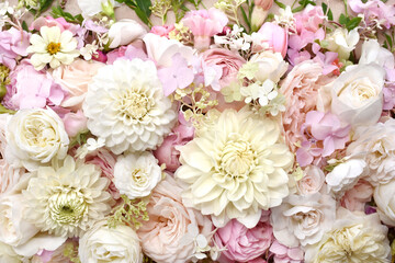 Delicate blooming festive roses and white dahlia summer flowers, blossoming rose flower soft pastel background, bridal bouquet floral card, selective focus, shallow DOF