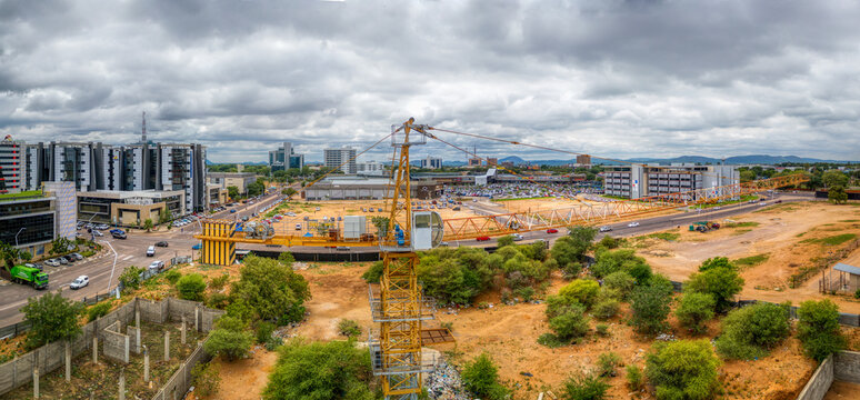 12 December 2024, Gaborone, Botswana, aerial view of Gaborone, capital of Botswana, african developments of cbd, ceda metropolitan insurance and the fields mall parking, crane, construction