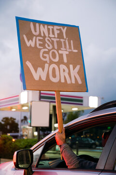Unify We Still Got Work Sign 
