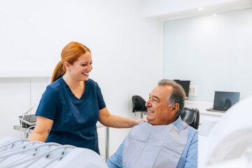 Dentist and patient enjoying a friendly conversation together