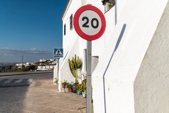 Pedestrian sign in white village