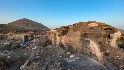 Los Roferos de Teseguite geological formations and Montana de Guenia in the background, Lanzarote island, Spain