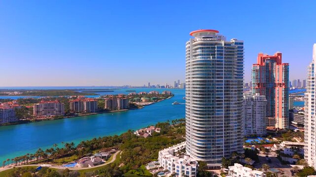2025 Miami Beach, Florida USA. Stock footage Miami Beach winter scene. View of highrise towers, parks, port harbor 4k 60fps