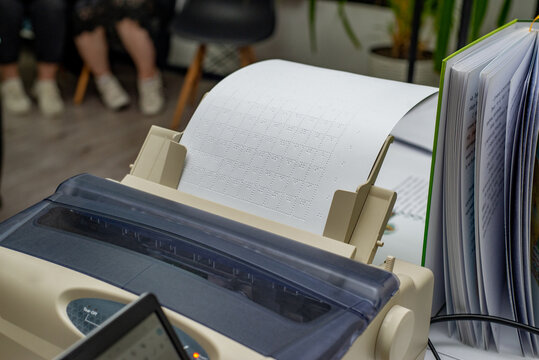 Special Printer Prints Multiplication Table in Braille with copyspace
