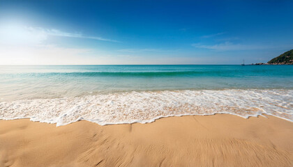 Obraz premium a coastal foreground texture scene to vicinity products at the sand with a blurred sea history on a sunny summer day