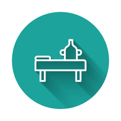 Fototapeta premium White line Massage table with oil icon isolated with long shadow. Green circle button. Vector