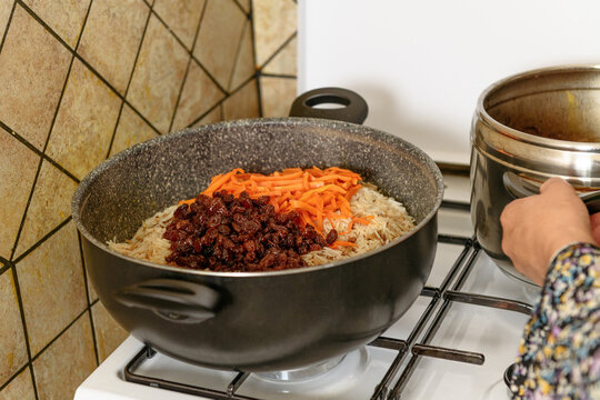 Traditional afghani pilaf Kabuli Pulao in the pot