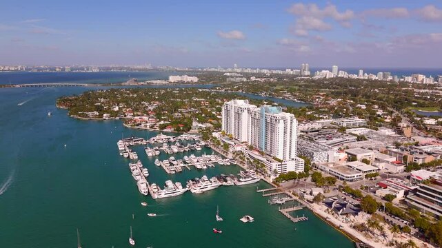 Aerial tour Miami 2025. Scenic landscape view of highrise towers with marina and Biscayne Bay