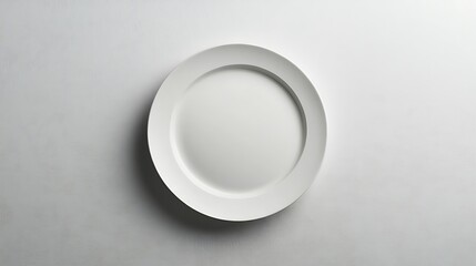 A White Ceramic Plate on a White Surface