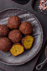 Fried chickpea falafel balls with salt, spices and herbs