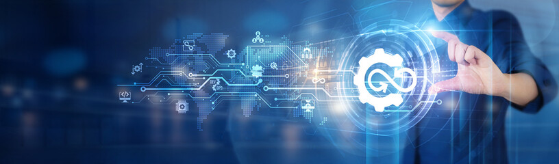 DevOps. Businessman hold DevOps automation network connecting icon for efficient collaboration,...