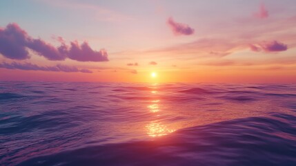 Naklejka premium Vibrant sunset over calm ocean water.