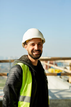 Portrait of a smiling engineer at the site