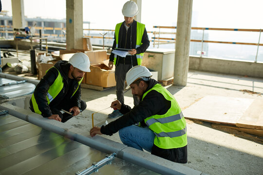 Group of engineers work in the building