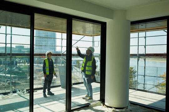 Supervisors assess the progress of the construction