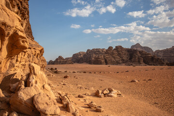 Sunny Scenery of Beautiful Desert in Jordan. Wadi Rum in Middle East with Rocky Mountains and Sandy Surface during Daytime.