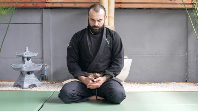 Martial arts master meditating in seiza position