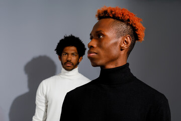 Two models  with contrasting hairstyles 