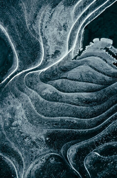 Abstract dark winter texture background with ice