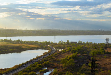 Top view of the picturesque natural and urban landscape at sunset