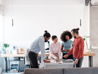 Diverse Team Collaborating on Project in Modern Office Space