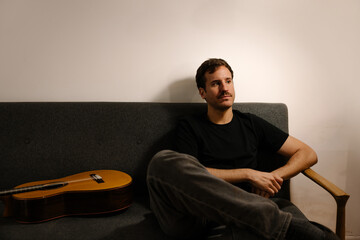 Young luthier creating Spanish flamenco guitars with passion